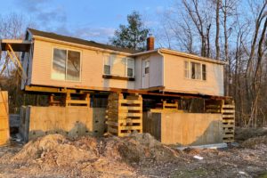 Concrete foundation under lifted house