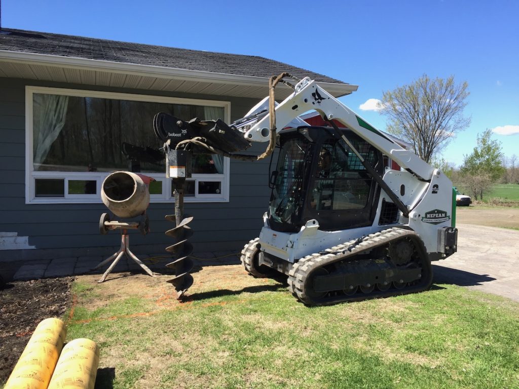 Skidsteer with Auger service Ottawa and Nepean